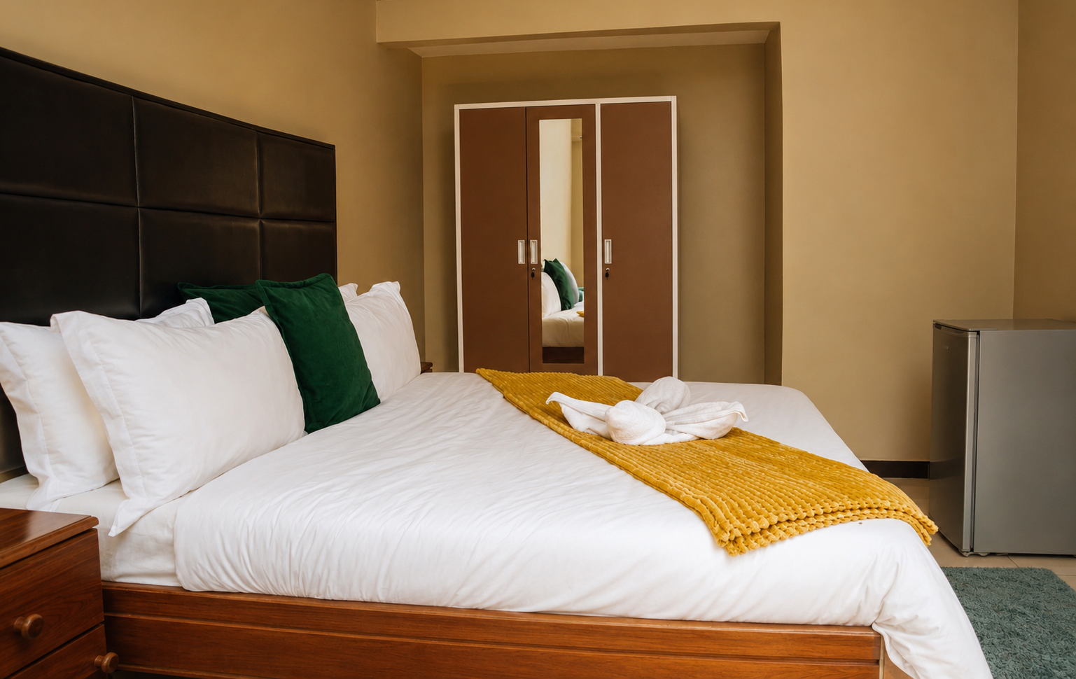 Standard Double room with green accent pillows